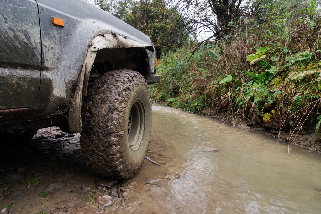 Off-road vehicle in mud