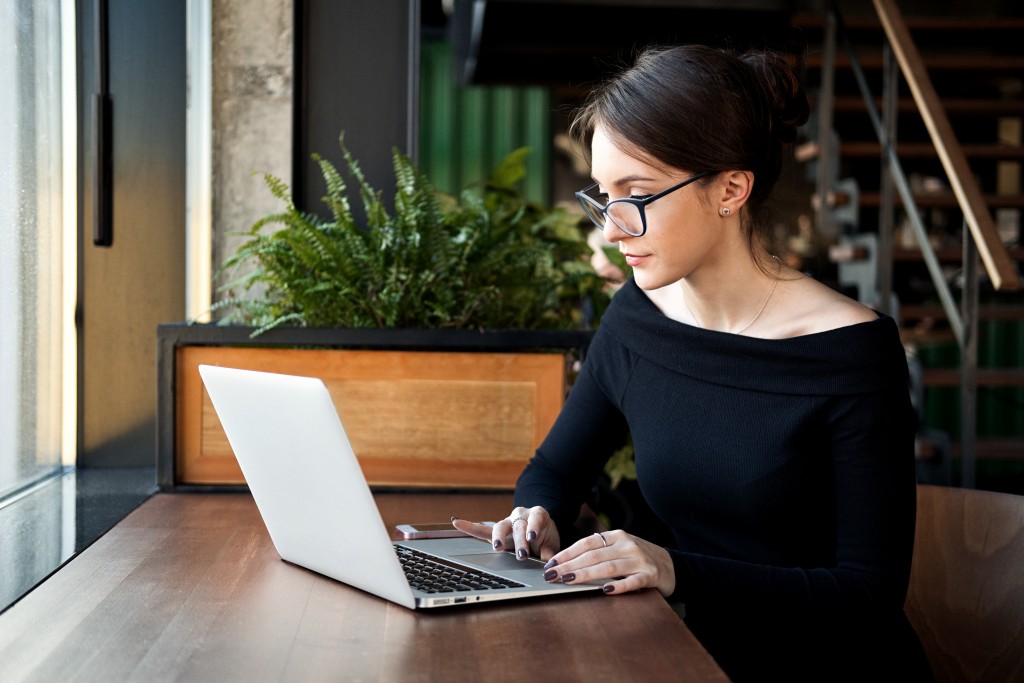 woman using laptop