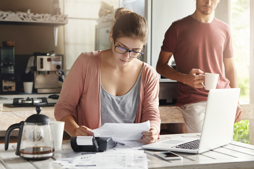 woman checking her bills