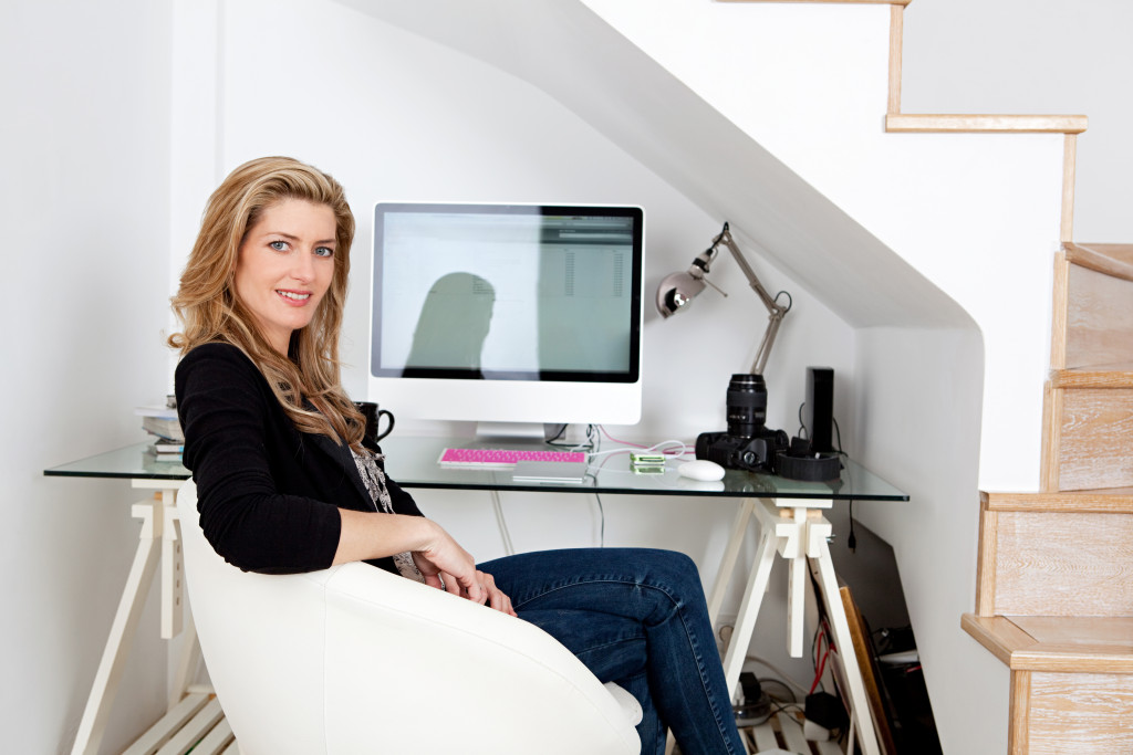 woman sitting in front of her computer