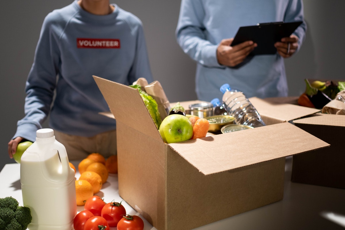 volunteer donating goods