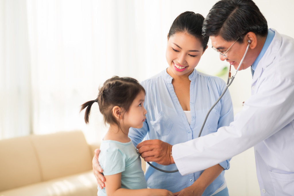 girl getting a check up