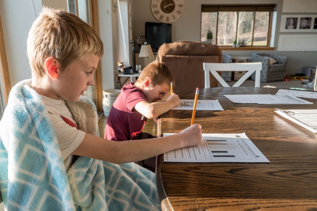 two kids doing homework