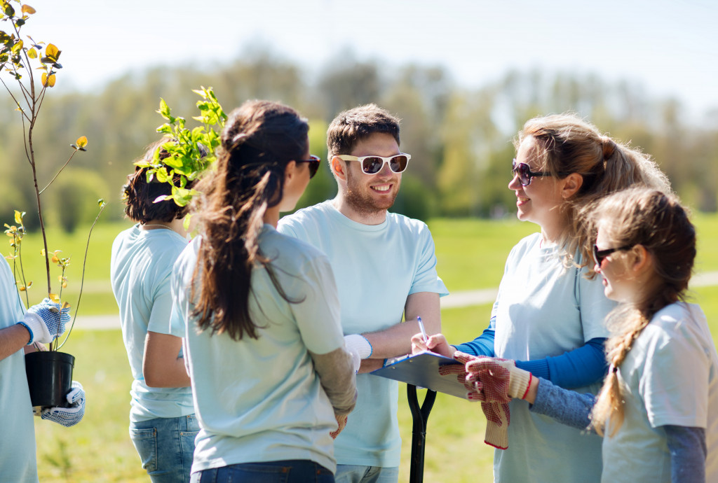 people planting a tree