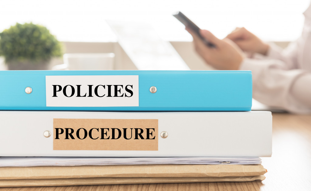 Policies and Procedures document place on desk