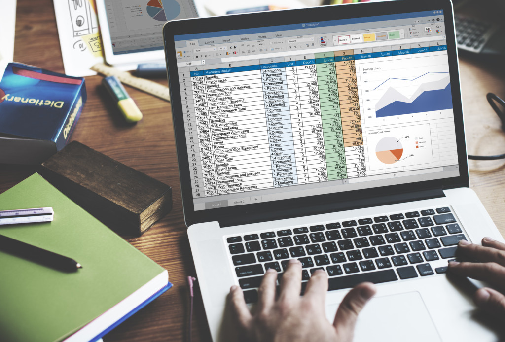 planning accounting on laptop budget sheet