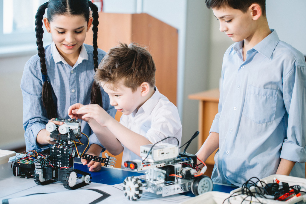 students exploring robotics systems