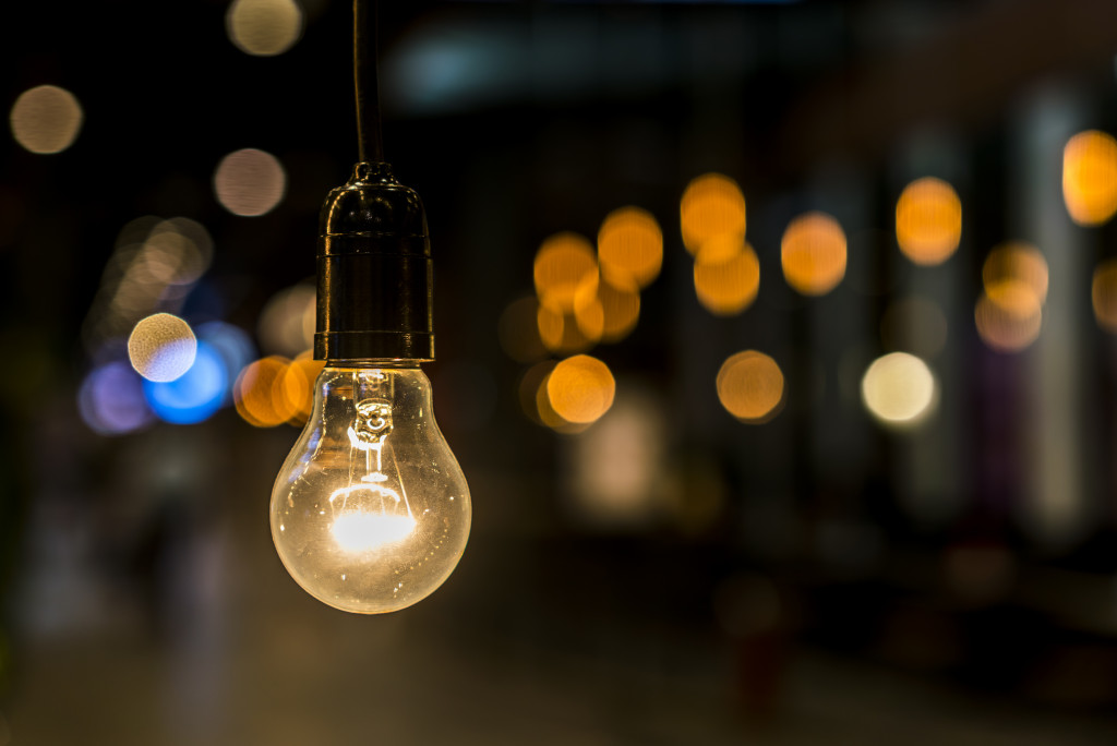 Close up of a yellow light bulb