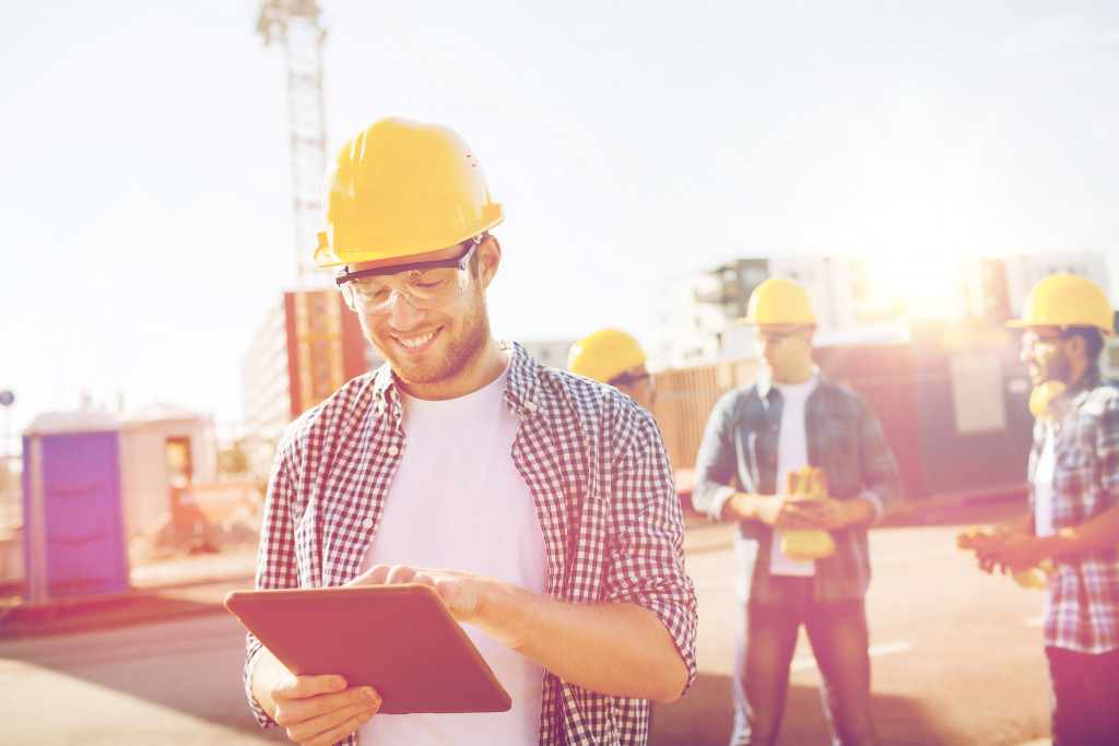 smiling construction workers in site