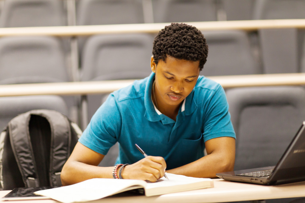 A young man studying