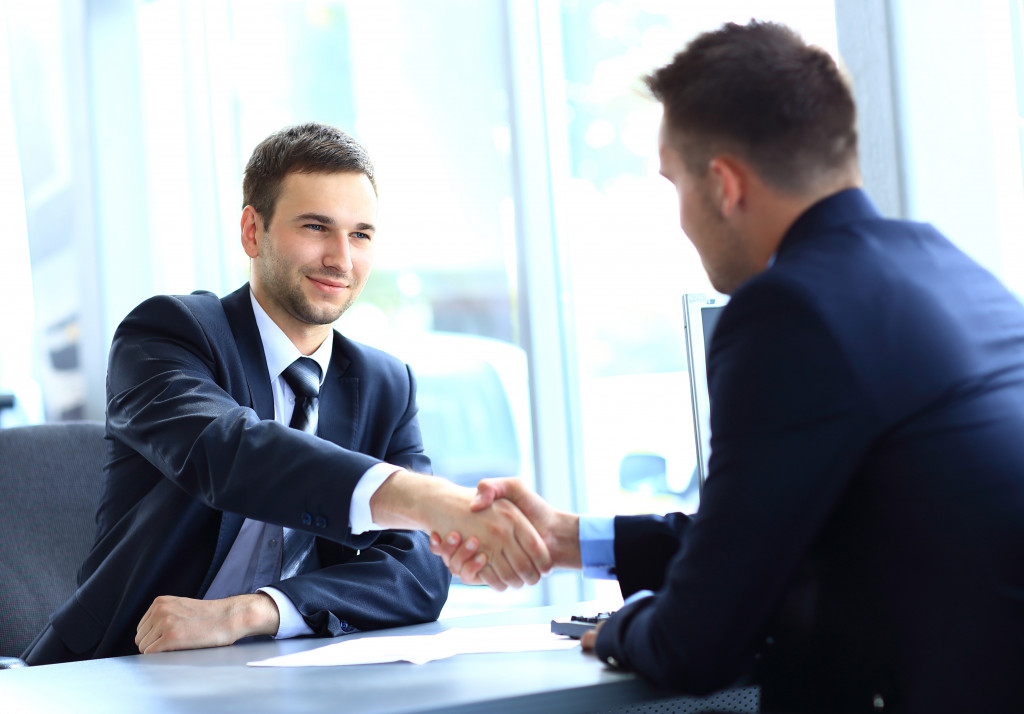 two businessmen handshake