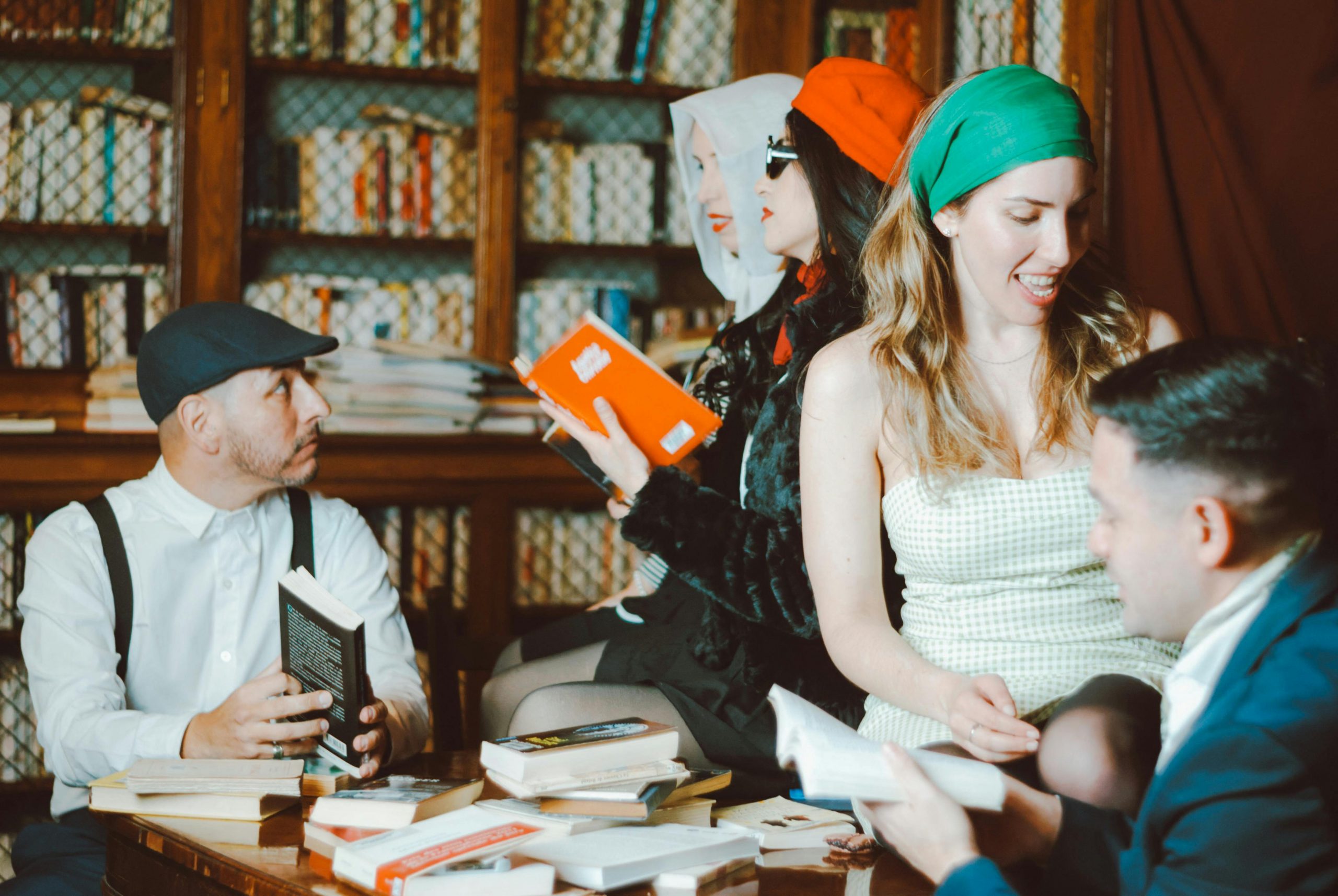 group of creatives gathering in a library