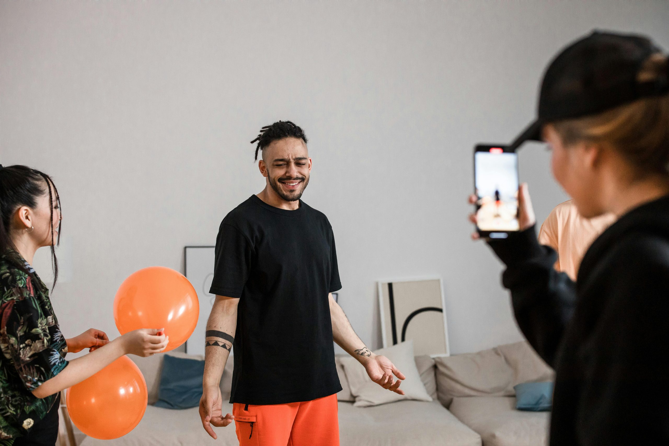 group of three people vlogging together